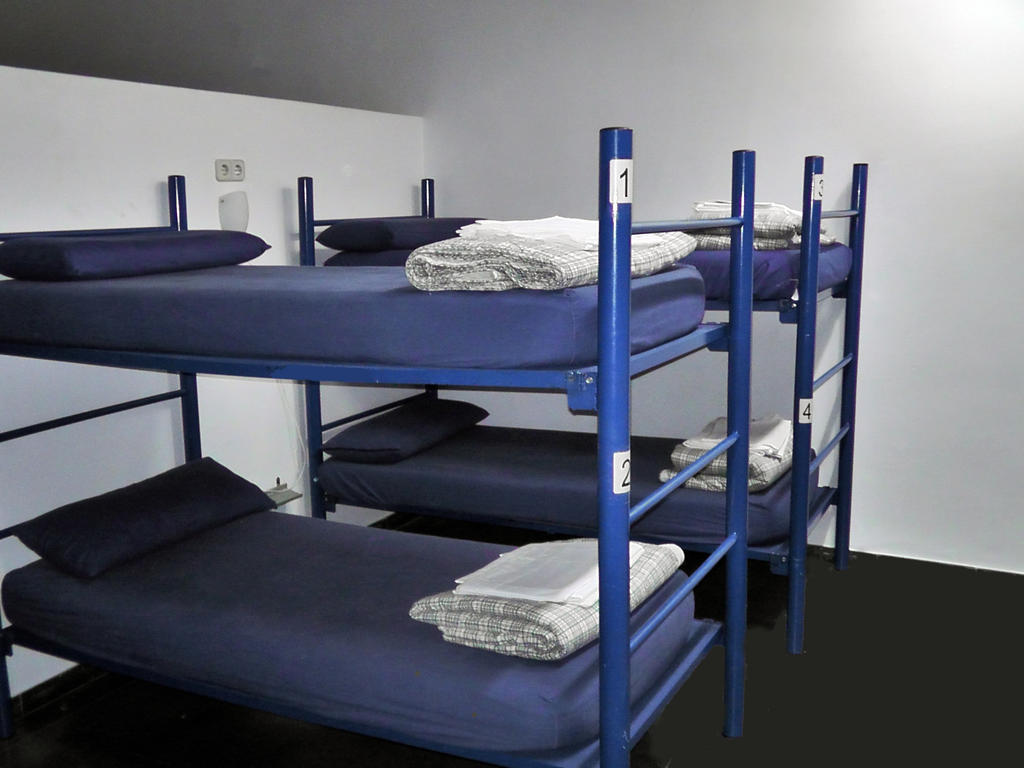 Cama en habitación compartida mixta de 8 camas